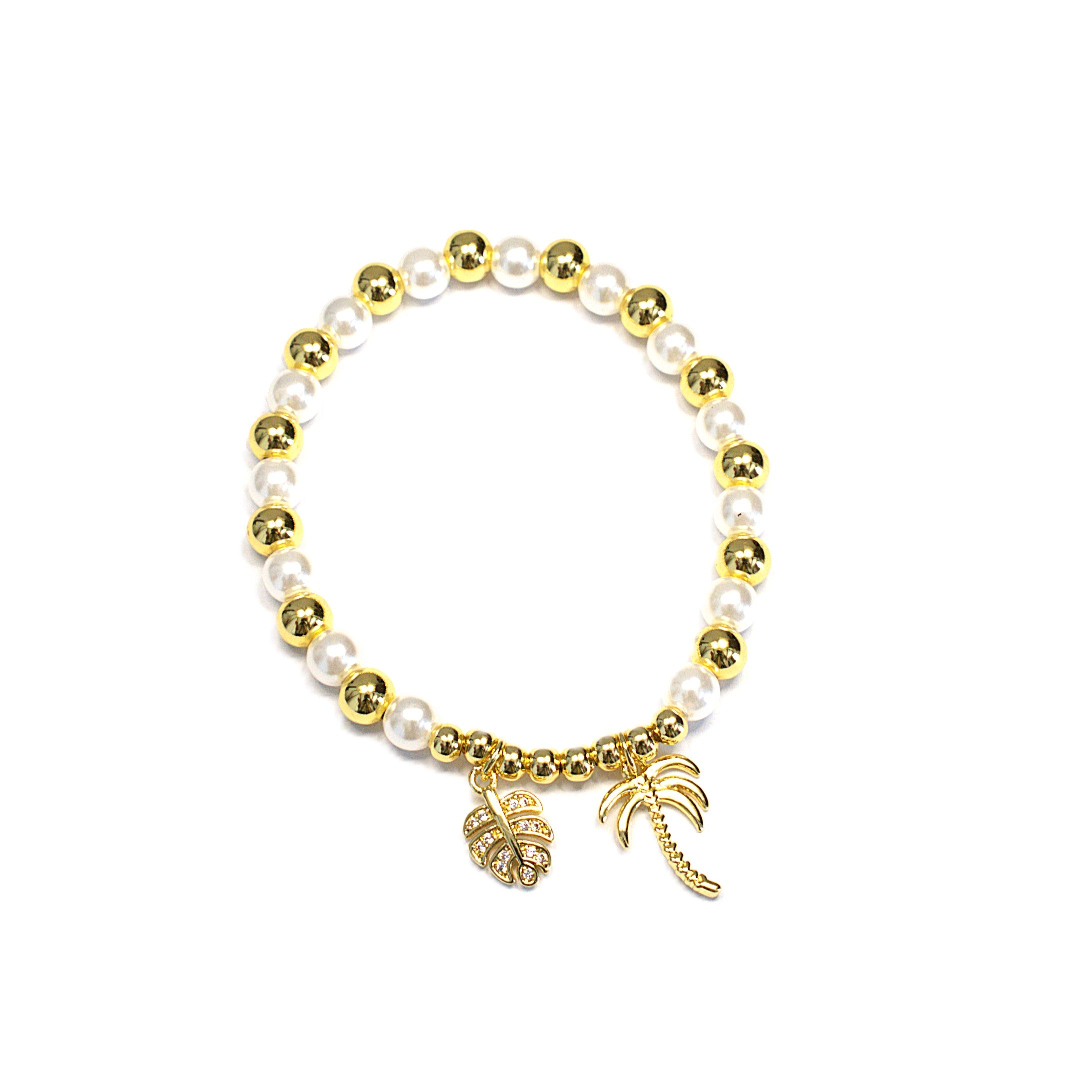 Brățară pe elastic cu bile albe si aurii- pandantiv palmier