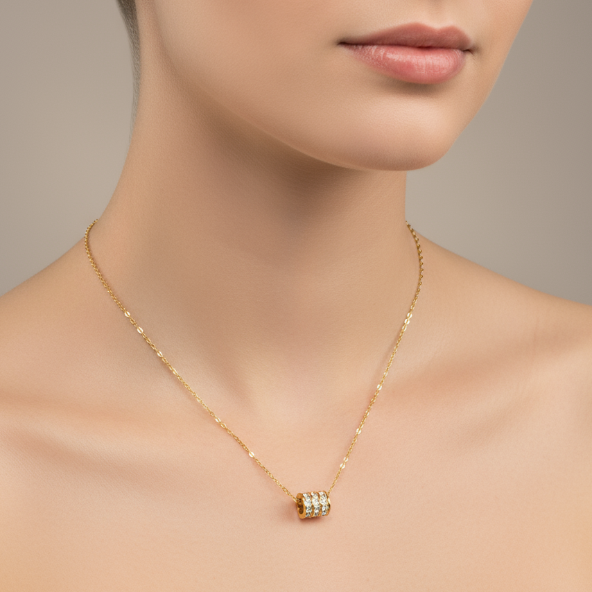 colier placat cu aur de 18K cu pandantiv elegant sub forma de tub cu pietricele( anti-stres)