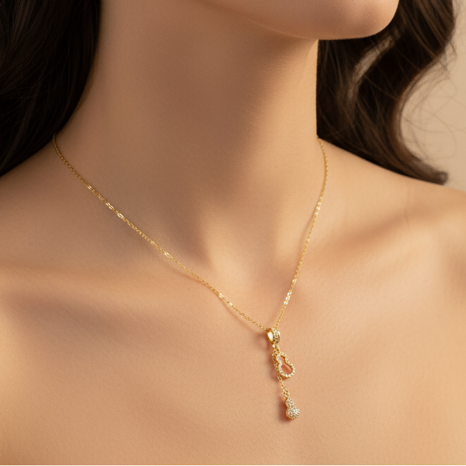 colier placat cu aur de 18K cu pandantiv elegant modelul ma completezi, o forma plina si una goala ambele formand un intreg