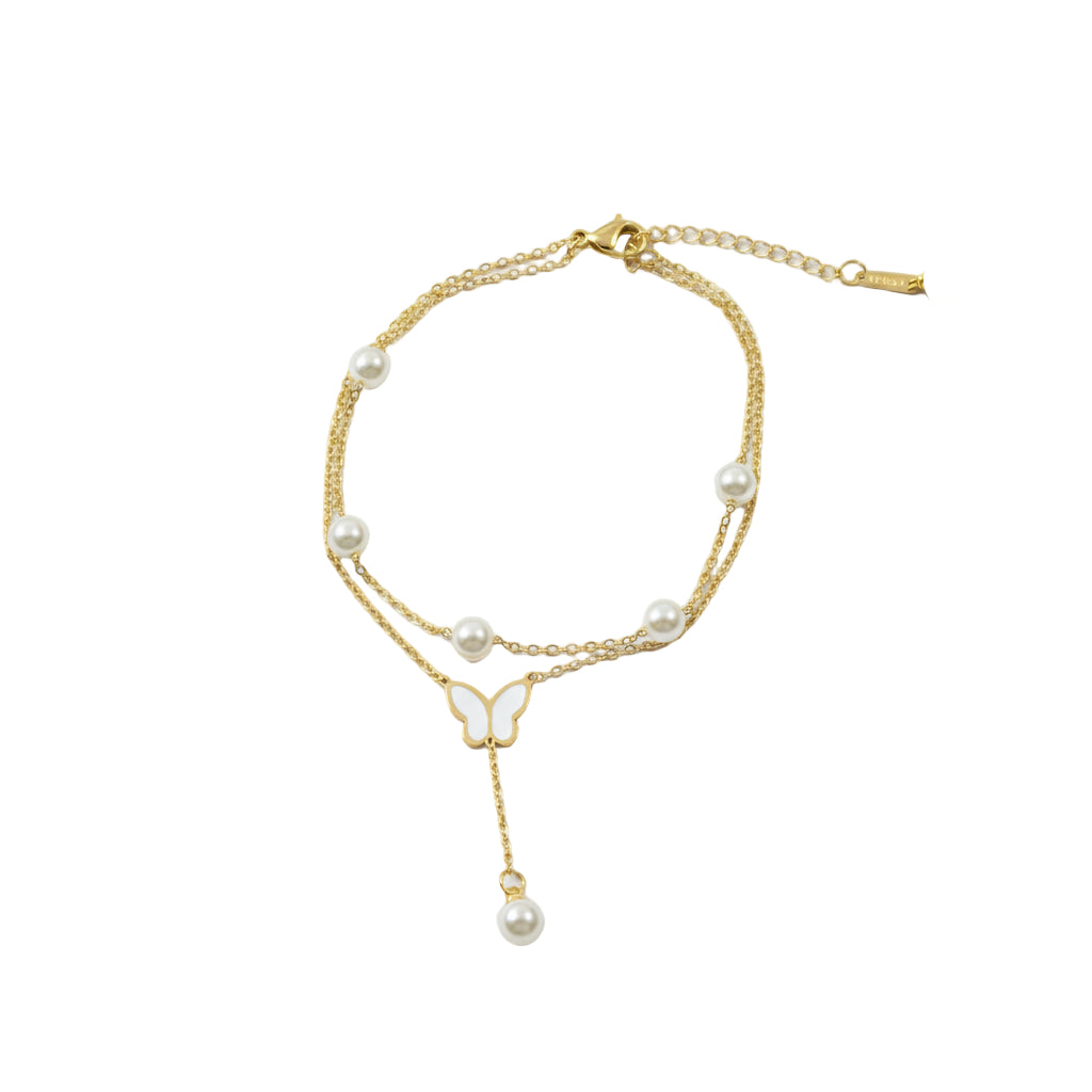 Brățară de picior din oțel inoxidabil placat cu aur, stil sofisticat din 2 lanturi unul cu bilute albe tip perle si unul simplu cu un pandativ de 3.5 cm care atarna,  cu fluture alb.
