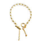 Brățară cu inchidere speciala tip clapeta cu bile aurii și albe