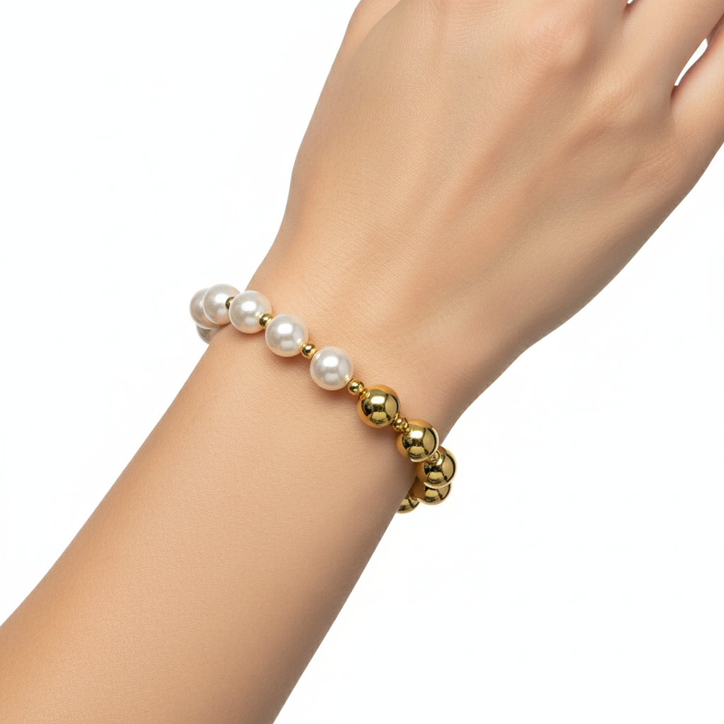 Brățară pe elastic cu bile albe și aurii mari si bile mici aurii despartitoare
