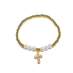 Brățară pe elastic cu bile albe și aurii și charm cruciulita cu pietre albe