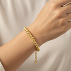 Brățară reglabilă cu bile aurii