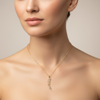 colier placat cu aur de 18K cu pandantiv elegant in forma de crenguta cu frunze, cu pietre